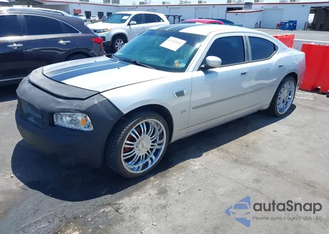 2010 Dodge Charger Sxt z USA, uszkodzony, nr VIN 2B3CA3CVXAH214351